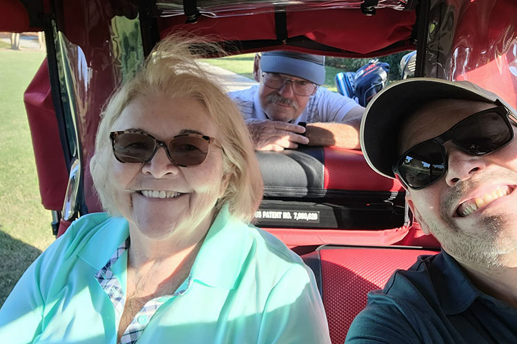 Shaffer, right, at the golf course with parents Michele and Daniel.